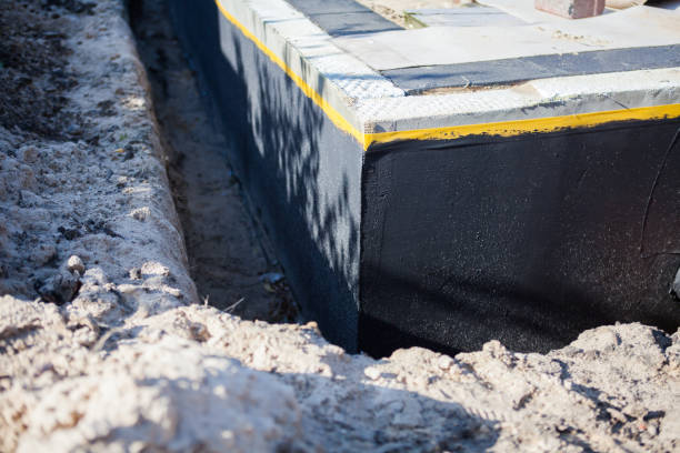 Professional Interior Drainage System technician working in Edison, NJ